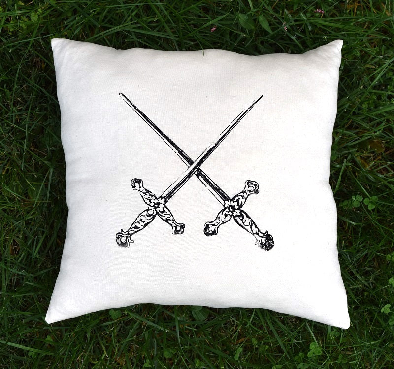 Crossed Swords vintage design printed throw decor pillow 17 in x 17 in made from 100% organic texas grown cotton and filled with a sustainable and premium cluster  fiber.  Handmade by A Little Pillow Company